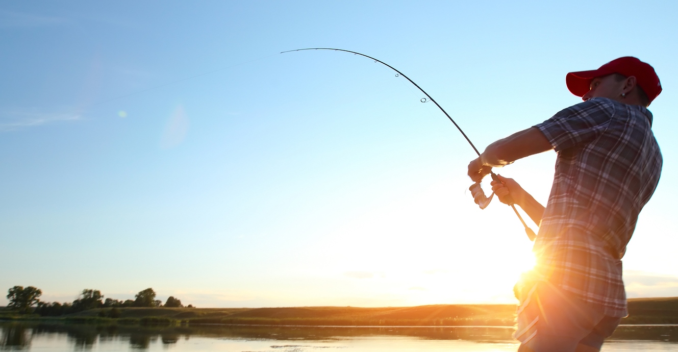 Young Man Fishing At Sunset - Blog Câu Cá